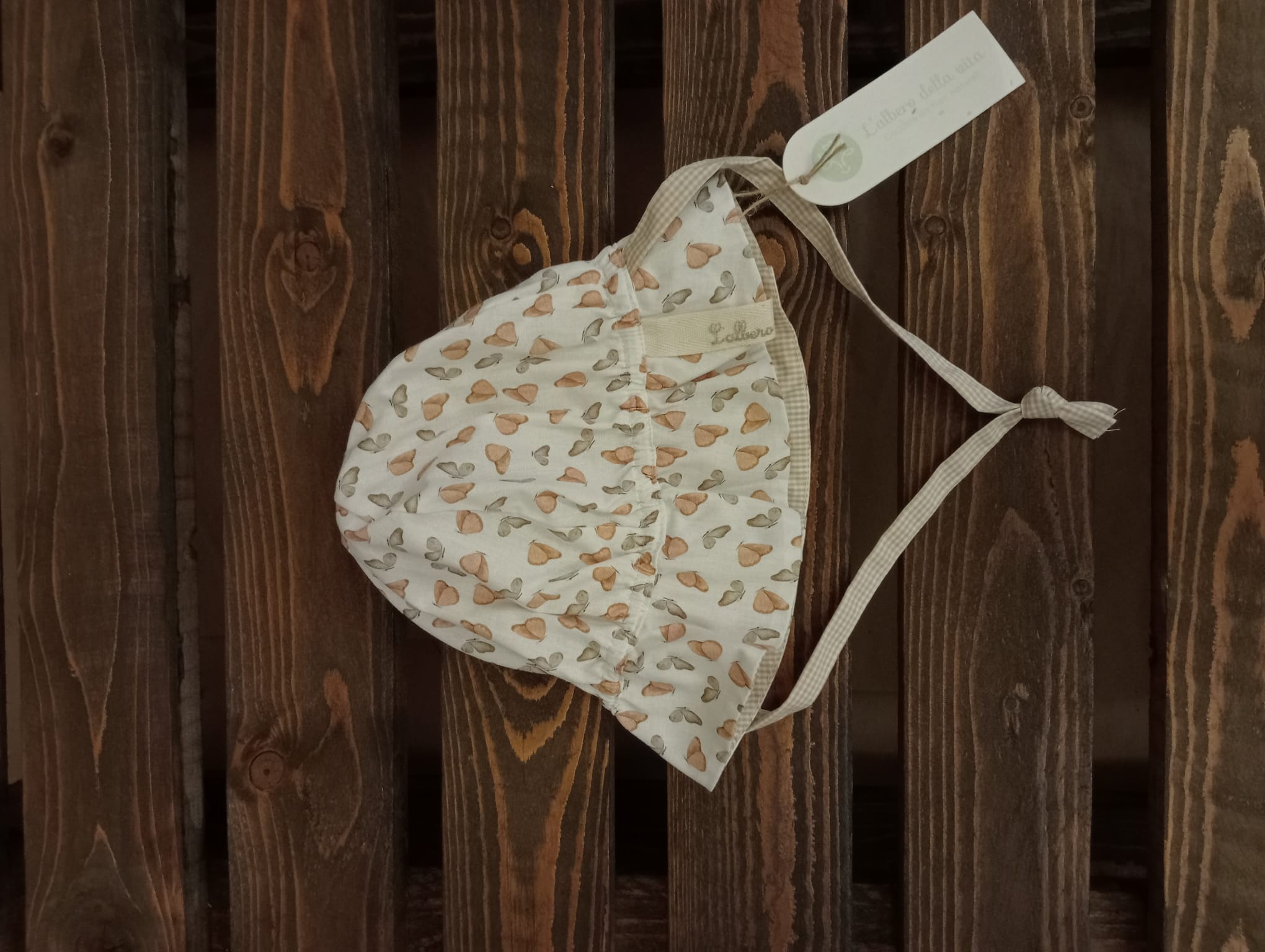 Cappello reversibile sbuffo farfalle